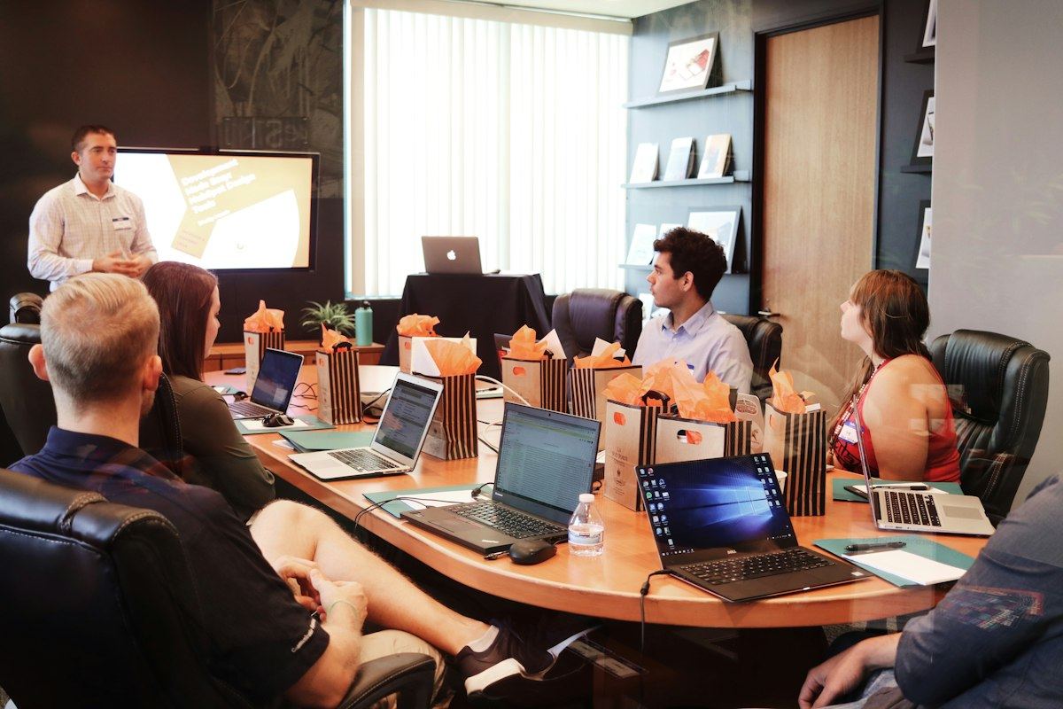 Attorneys and staff meeting around a conference table
